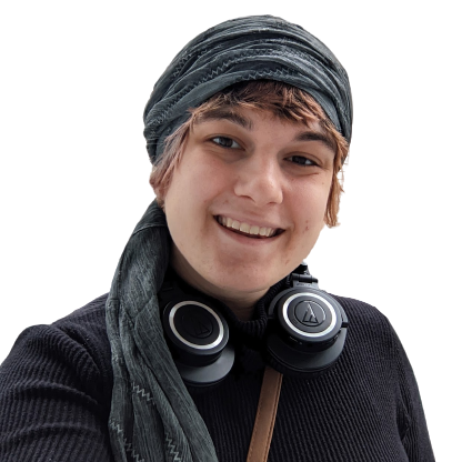 picture of june wunder smiling, she is a white woman wearing a gray tichel and brown hair peaking out from under the tichel. she is also wearing headphones 